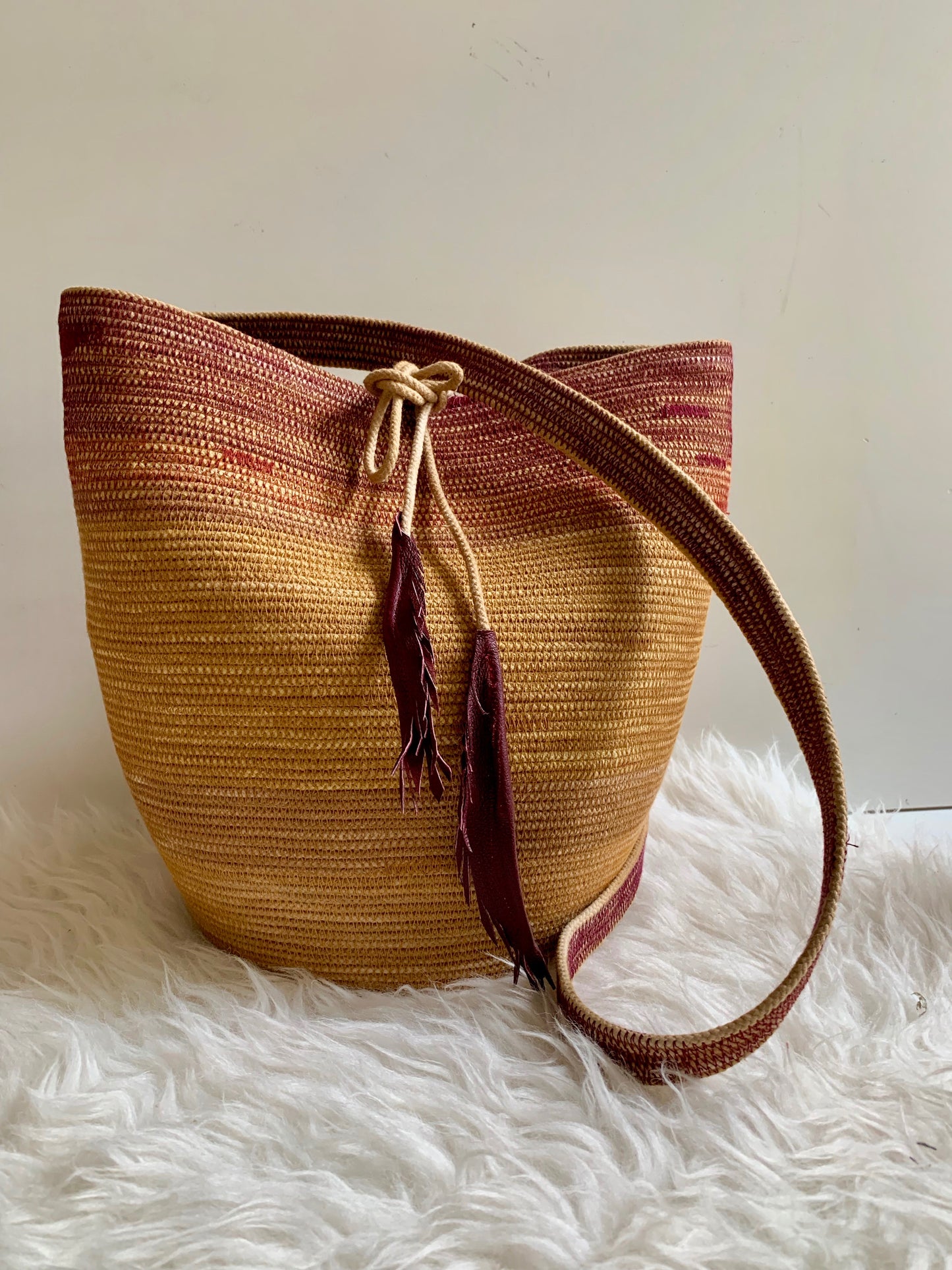 mustard and crimson rope basket backpack